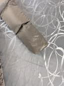 Krásný péřový kabát Puma, velikost XS — second hand, velmi dobrý — detail 6