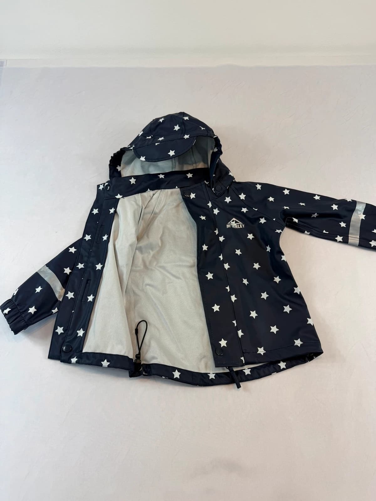 McKinley nepromokavá bunda, velikost 92 — second hand, velmi dobrý