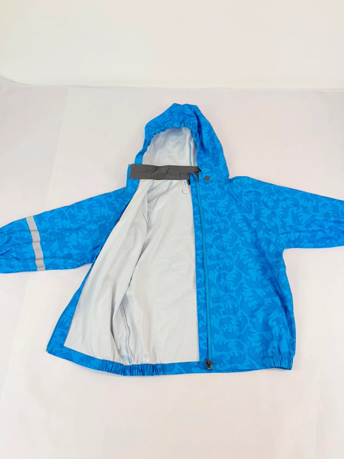 Nepromokavá bunda H&M, velikost 110-116 — second hand, velmi dobrý